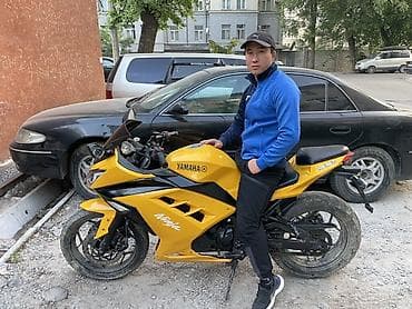 ninja h2: Спортивный мотоцикл в ярком жёлтом цвете с агрессивным дизайном — 1