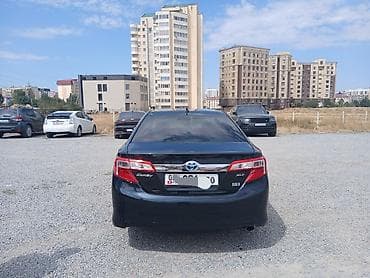 low ll: Toyota Camry: 2012 г., Гибрид, Седан — 2