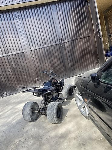 азия мото: Квадроцикл компактного класса, черный цвет. Особенности и оснащение — 2