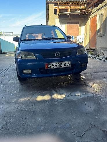 Транспорт: Mazda Demio: 2000 г., 1.5 л, Кол менен иштөөчү, Бензин, Хетчбек — 1