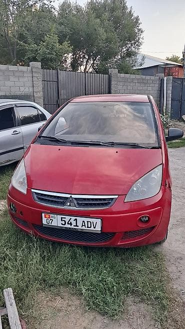 круглый: Mitsubishi Colt: 2006 г., 1.3 л, Механика, Бензин, Хэтчбэк — 6