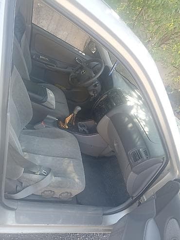 kia pegas: Mazda 323: 2001 г., 1.8 л, Механика, Седан — 2