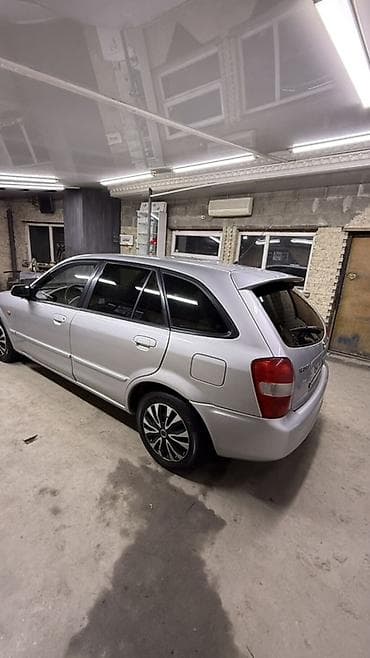 вместе дешевле: Mazda 323: 2001 г., 1.6 л, Механика, Бензин, Универсал — 4