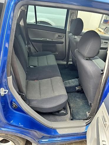 спорт глушитель: Mazda Demio: 2003 г., 1.5 л, Механика, Бензин, Хэтчбэк — 6