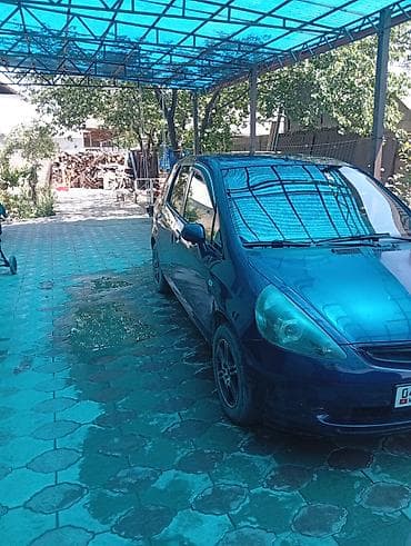 e2 byd: Компактный хэтчбек синего цвета. Основные характеристики по фото: - — 4