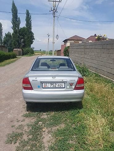 Mazda Protege: 1999 г., 1.8 л, Автомат, Седан — 3