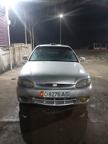 2 8: Hyundai Accent: 1997 г., 1.4 л, Механика, Бензин, Лифтбек — 1