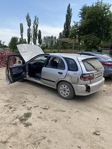 Унаа: Nissan Almera: 1999 г., Кол менен иштөөчү, Бензин, Хетчбек — 3