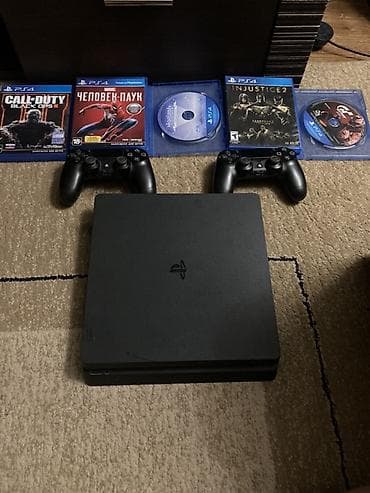 PS4 (Sony PlayStation 4): PlayStation 4 Slim (черная) В комплекте: - Консоль PS4 Slim 1 tb - 2 — 2