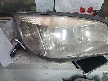 opel: Передняя правая фара Opel Б/у — 1
