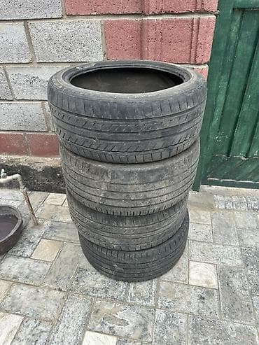 Летние автомобильные шины, комплект из 4 шт. По бокам есть трешины
