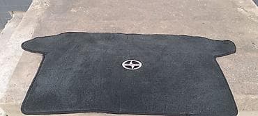 обшивка материал: Родные Ворсовые Полики Для багажника Scion, цвет - Серый, Б/у — 1