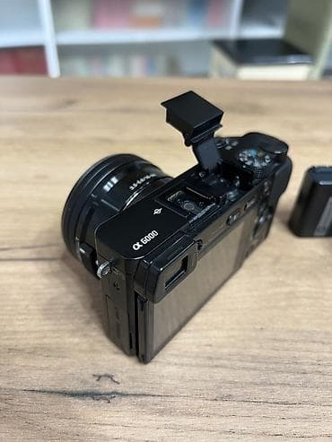 Видеокамералар: Беззеркальная камера Sony Alpha a6000 с объективом E PZ 16–50mm — 2