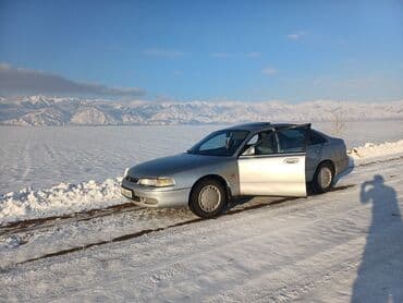 Mazda Cronos: 1995 г., 2 л, Механика, Бензин, Седан