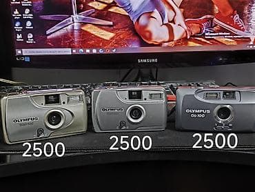 Техника и электроника: Пленочные компактные фотоаппараты Olympus: 1) Olympus Trip 500 - 35 — 1