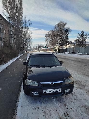bmv e46: Mazda 323: 1999 г., 1.5 л, Механика, Бензин, Хэтчбэк — 3