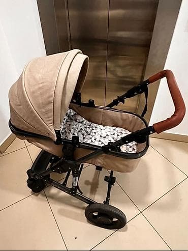Балдар дүйнөсү: Прогулочная коляска бежевого цвета, предназначенная для новорожденных — 1