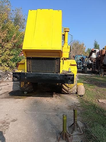 Унаа: Колёсный трактор высокой мощности (артiculированный, 4х4), жёлтый — 2