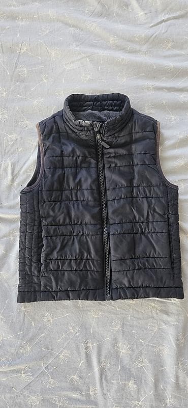 Другие жилеты цвет - Черный