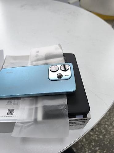 aipad mini 6: Смартфон Redmi Note 14 в голубом цвете — 9