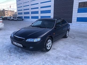 глушитель выхлоп: Mazda 626: 2000 г., 1.8 л, Механика, Бензин, Седан — 9