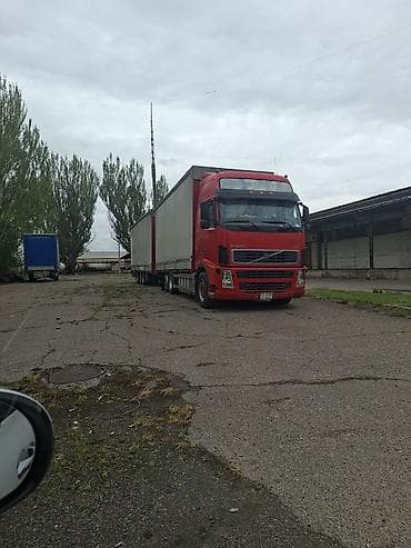 Тандем с прицепом тентованного типа - Марка тягача: Volvo (серия FH) at lalafo.kg Тандем с прицепом тентованного типа - Марка тягача: Volvo (серия FH)