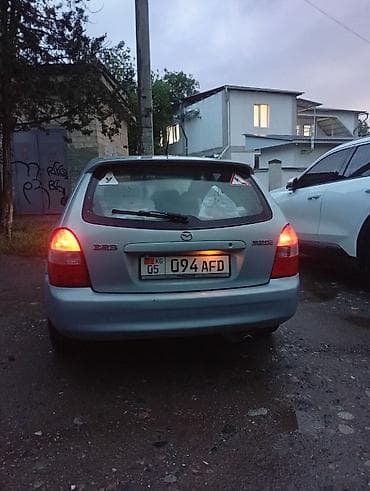 mazda demio 2004: Mazda 323: 2002 г., Механика, Хэтчбэк — 5