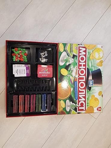 монополи: Настольная игра «Монополист» (русская версия) Комплект: - Игровое — 3