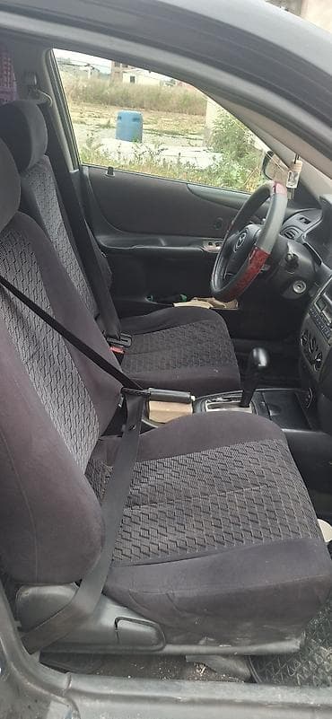 familia: Mazda Familia: 2001 г., Автомат, Бензин, Седан — 5