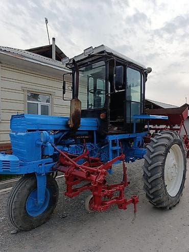 монипулятор кант: Колёсный трактор с навесным культиватором/сеялкой (междурядная — 3
