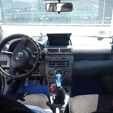 бу чехлы: Mazda Demio: 2005 г., Ручные, Хэтчбэк — 6