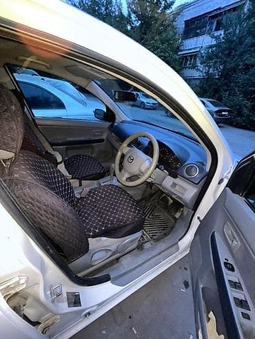 wuling mini ev: Mazda 2: 2003 г., Автомат, Хэтчбэк — 6