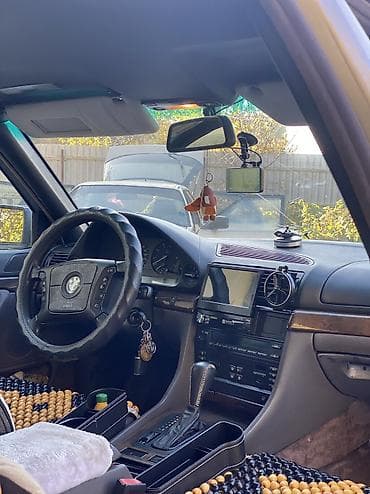 34 е: BMW 7 series: 1995 г., 4 л, Автомат, Газ, Седан — 8