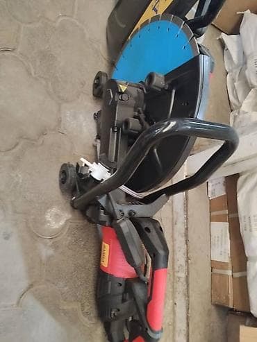 Электрическая отрезная пила (дисковая/резчик) для камня и бетона. -