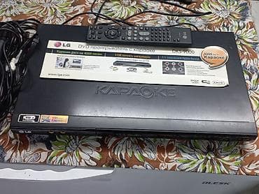 LG DKS-9000 — DVD-проигрыватель с караоке Комплектация: -
