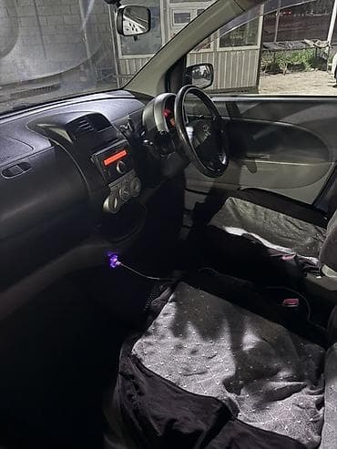 кара погрушик: Toyota Passo: 2004 г., Хэтчбэк — 8