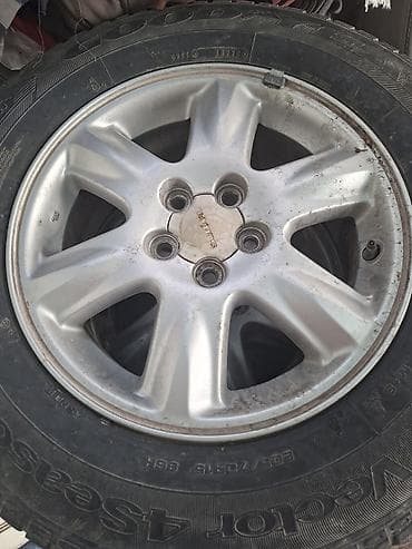 5: Комплект колес Subaru на дисках + всесезонные шины Goodyear - Диски — 1
