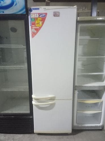 кухонная: Холодильник двухкамерный, класс энергопотребления A. Особенности: - — 1