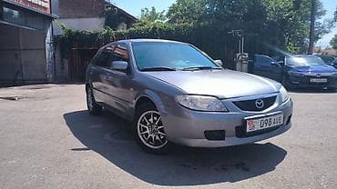 Mazda Familia: 2003 г., 1.6 л, Механика, Бензин, Универсал — 2