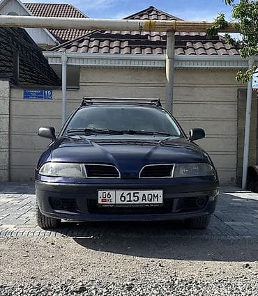 сидения на фуру: Mitsubishi Carisma: 2000 г., 1.6 л, Автомат, Газ, Седан — 1