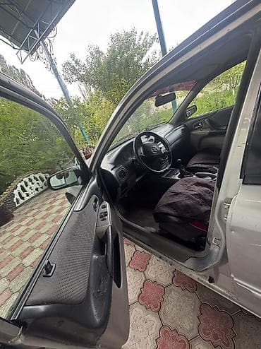 пасат бы 3: Mazda Familia: 2002 г., 1.3 л, Бензин, Универсал — 5
