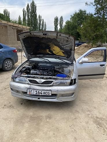 Унаа: Nissan Almera: 1999 г., Кол менен иштөөчү, Бензин, Хетчбек — 2
