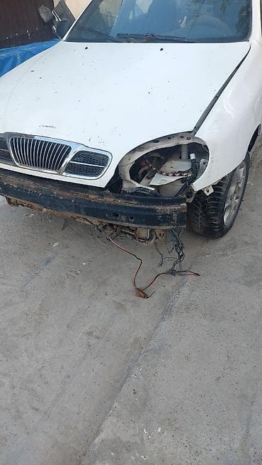 daewoo centra: Daewoo Lanos II, бензин, механическая коробка передач. Белый седан — 1