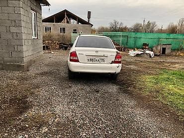 daf 75: Mazda 323: 1999 г., 1.9 л, Автомат, Дизель, Седан — 6