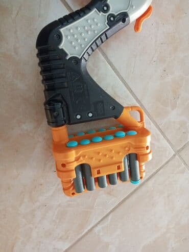 пистолет стреляет орбизами: Бластер NERF Doomlands Lawbringer - Механический револьверный бластер — 4