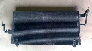 ремонт радиаторов охлаждения автомобилей: Mitsubishi Diamante Радиатор кондиционера, Митсубиси Диамант — 1