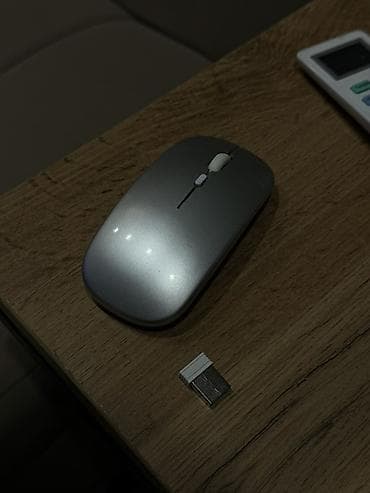 Беспроводная компьютерная мышь с USB‑приемником. - Компактный тонкий