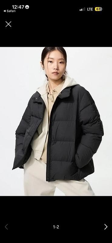 спортивные пуховики женские: Женская утеплённая куртка-пуховик, черного цвета. Юникло - Силуэт — 1