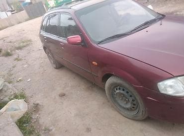 bmv e32: Mazda 323: 2001 г., 1.5 л, Универсал — 3