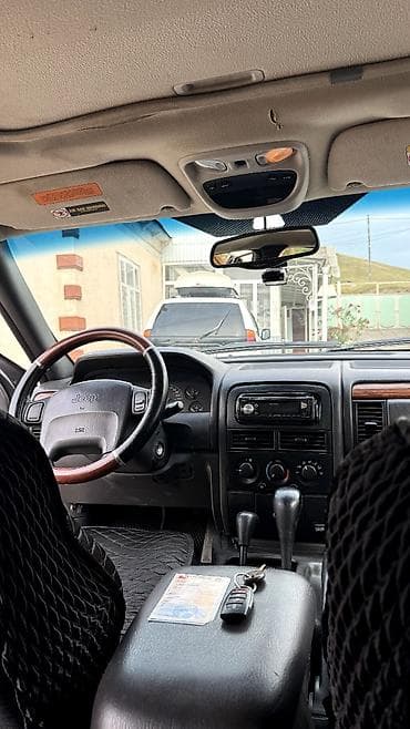 ml 430: Jeep Grand Cherokee: 1999 г., Автомат, Бензин, Внедорожник — 8